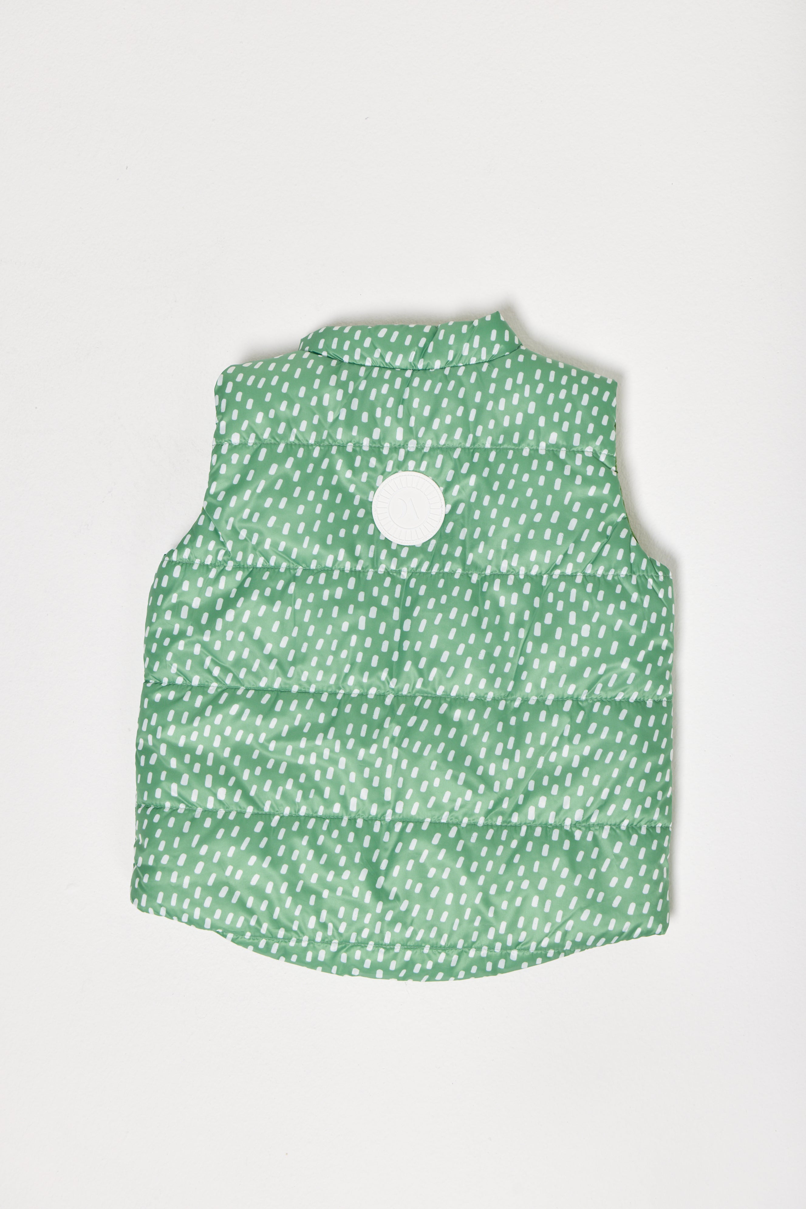 Kids Dots x Green Gilet™ — lightweight sleeveless puffer vest with playful white dot print on green, perfect for layering in South Africa