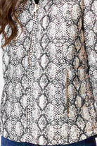 Women’s reversible cream puffer jacket with python-print inner lining and hood, lightweight insulated outerwear from Duck Apparel South Africa