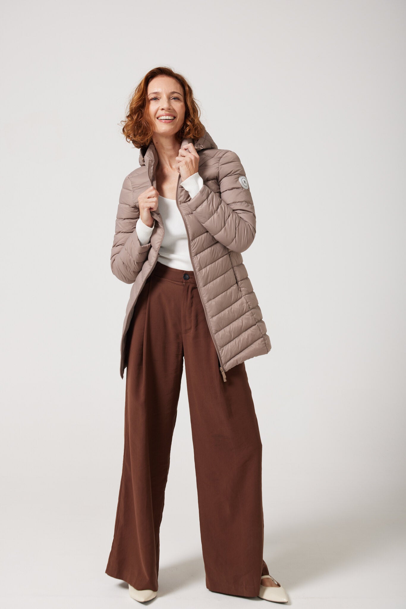 Chai Classic Parka™ in soft beige chai shade, insulated hooded parka designed for warmth and comfort in South Africa’s winter season