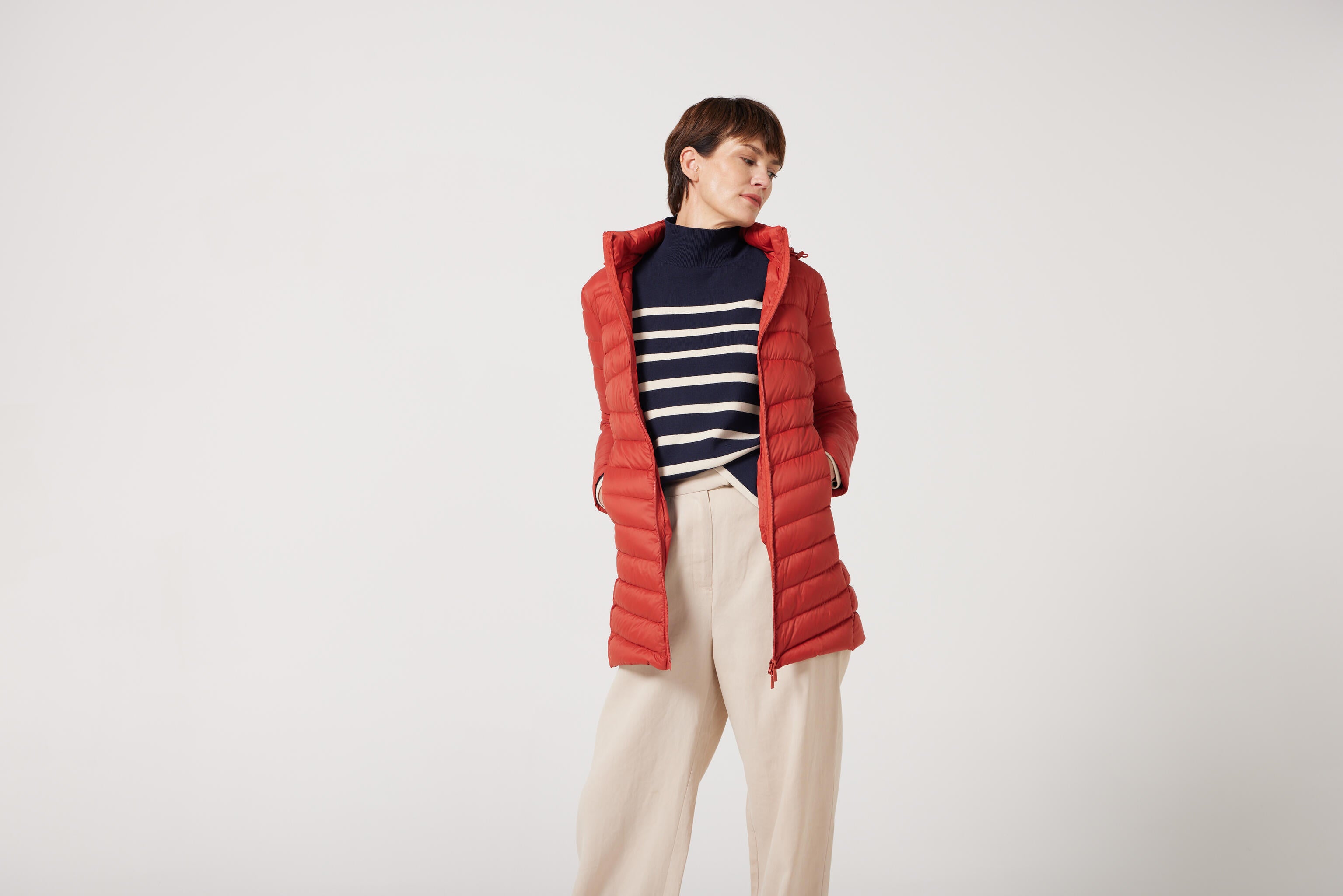 Women’s insulated hooded parka in rust red, designed for warmth and comfort in South Africa’s winter season — Rust Classic Parka™