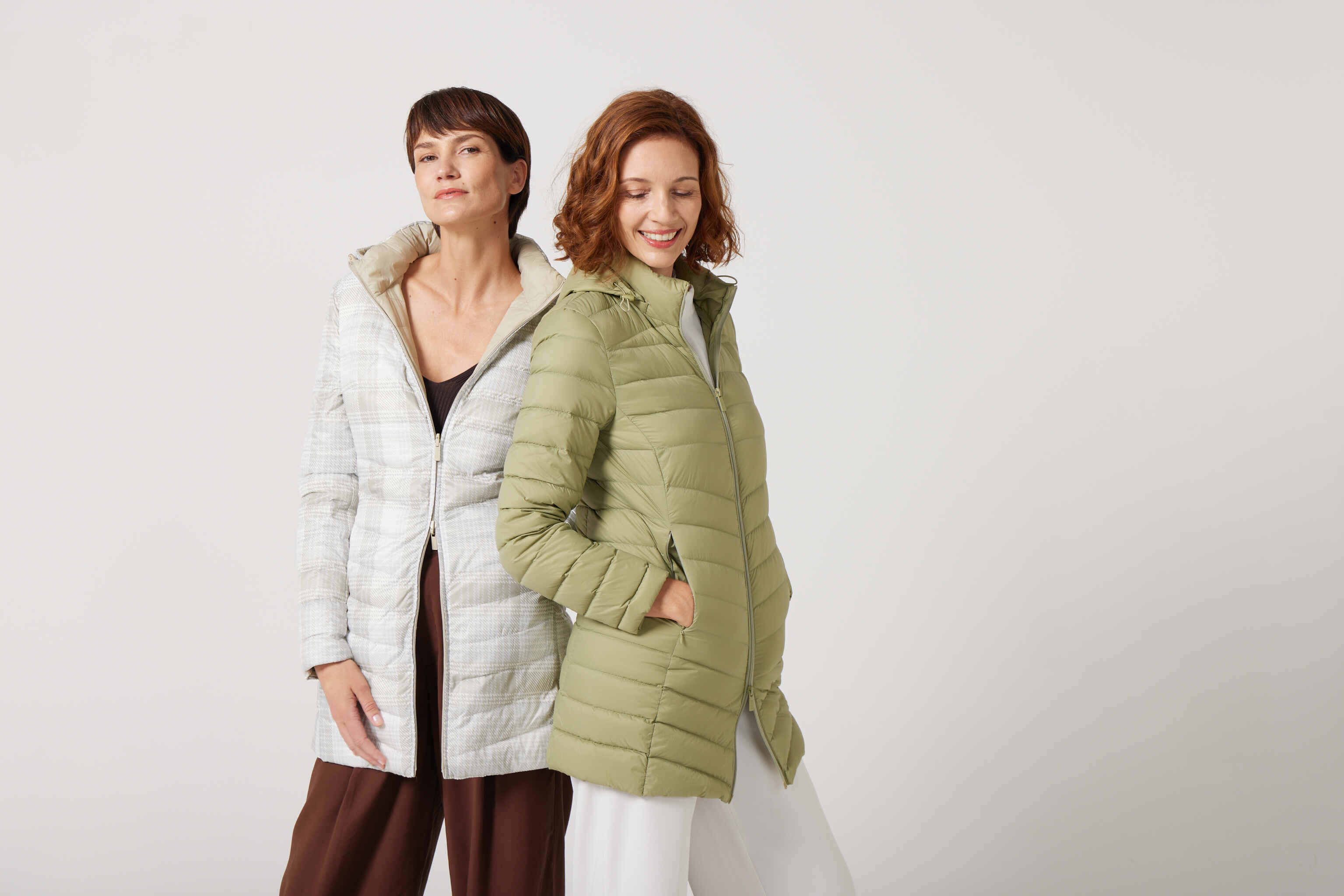 Tartan x Mist Classic Parka™ in light tartan check, insulated hooded reversible parka offering warmth and versatility for South Africa’s winter season and Matcha Classic Parka™ in light green matcha shade, insulated hooded parka designed for warmth and comfort in South Africa’s winter season