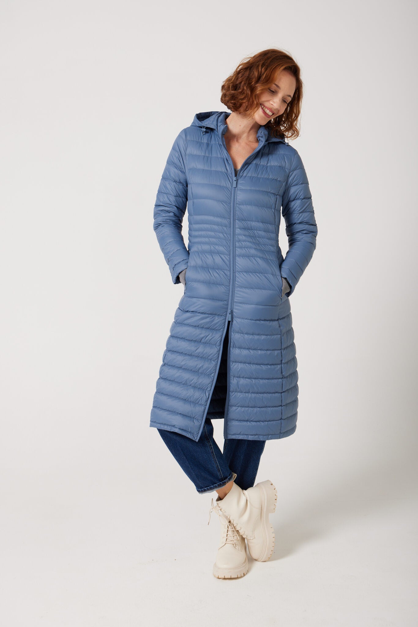 Women’s insulated ultra-length hooded parka in sky blue, designed for extra warmth and comfort in South Africa’s winter season — Vista Ultra Parka™
