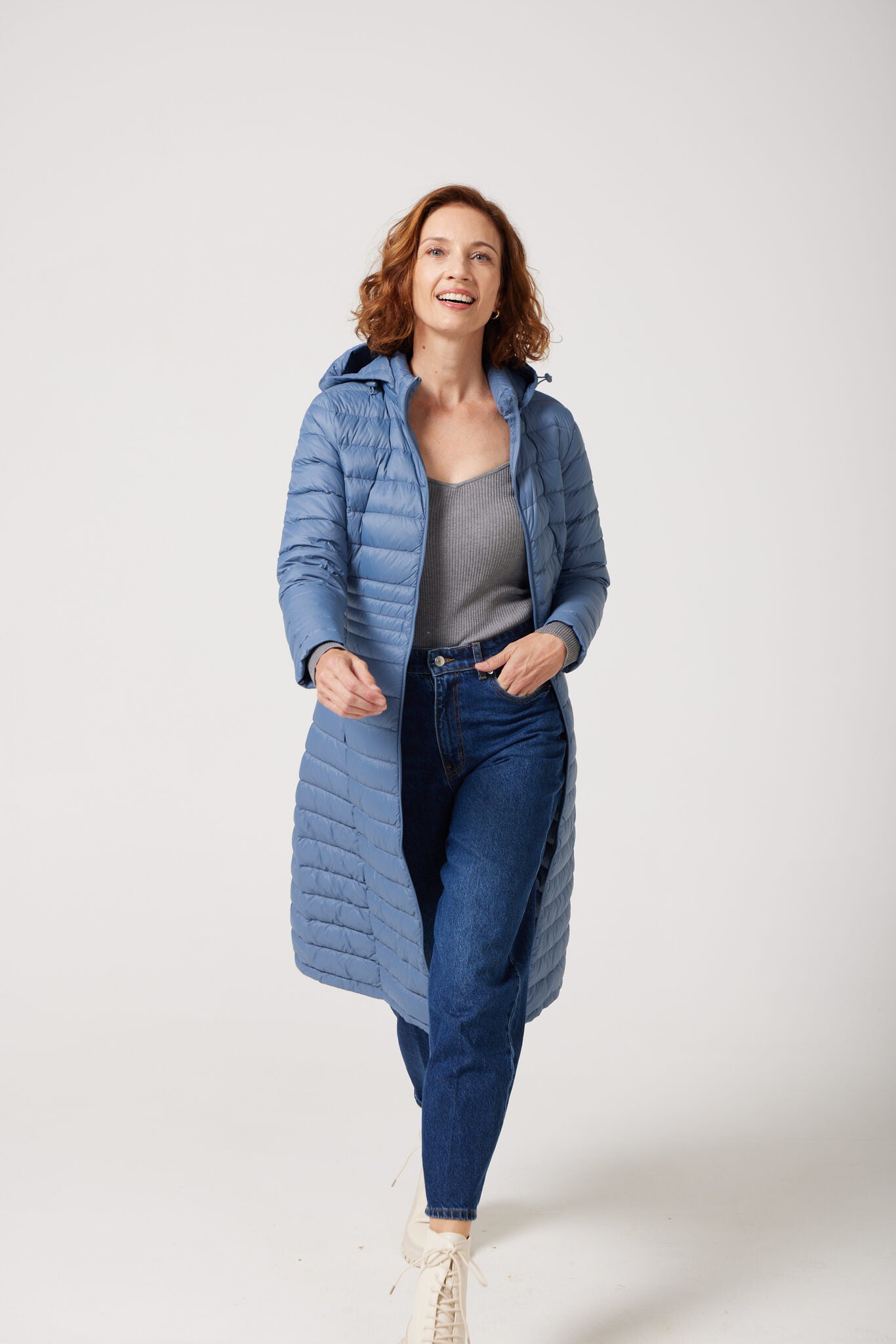 Women’s insulated ultra-length hooded parka in sky blue, designed for extra warmth and comfort in South Africa’s winter season — Vista Ultra Parka™