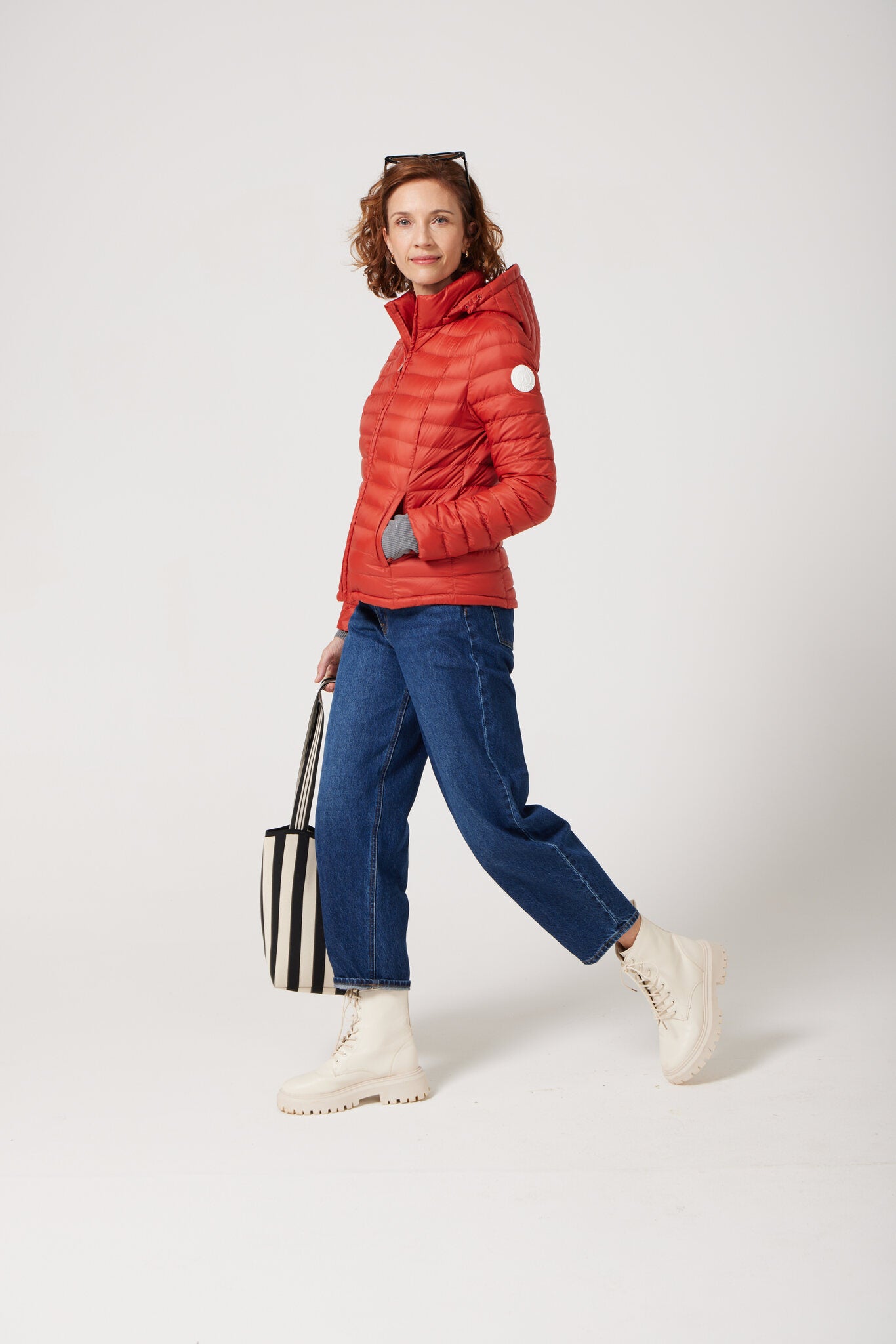 Women’s Rust Classic Jacket™ in bold red, lightweight puffer jacket for casual wear and versatile outerwear in South Africa