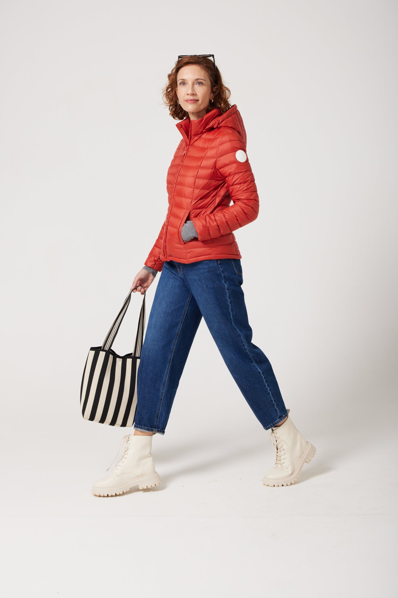 Women’s Rust Classic Jacket™ in bold red, lightweight puffer jacket for casual wear and versatile outerwear in South Africa
