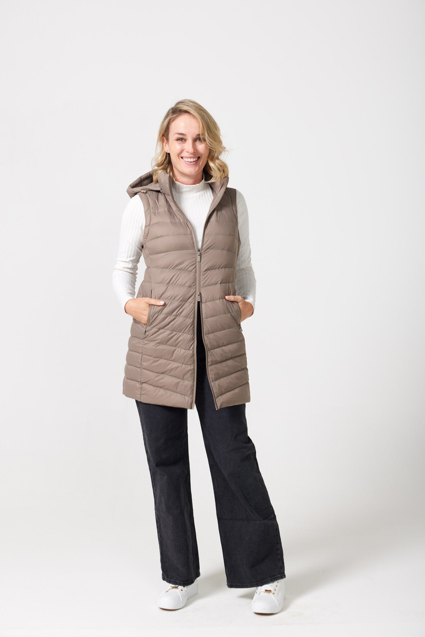 Chai Longline Gilet™ — women’s sleeveless quilted puffer vest in neutral chai brown, longline design with hood, ideal for layering in South Africa