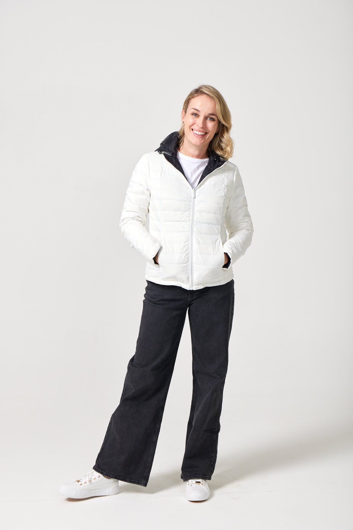Women’s reversible puffer jacket in white and black, lightweight and warm for layering in South Africa — Midnight x Salt Classic Jacket™