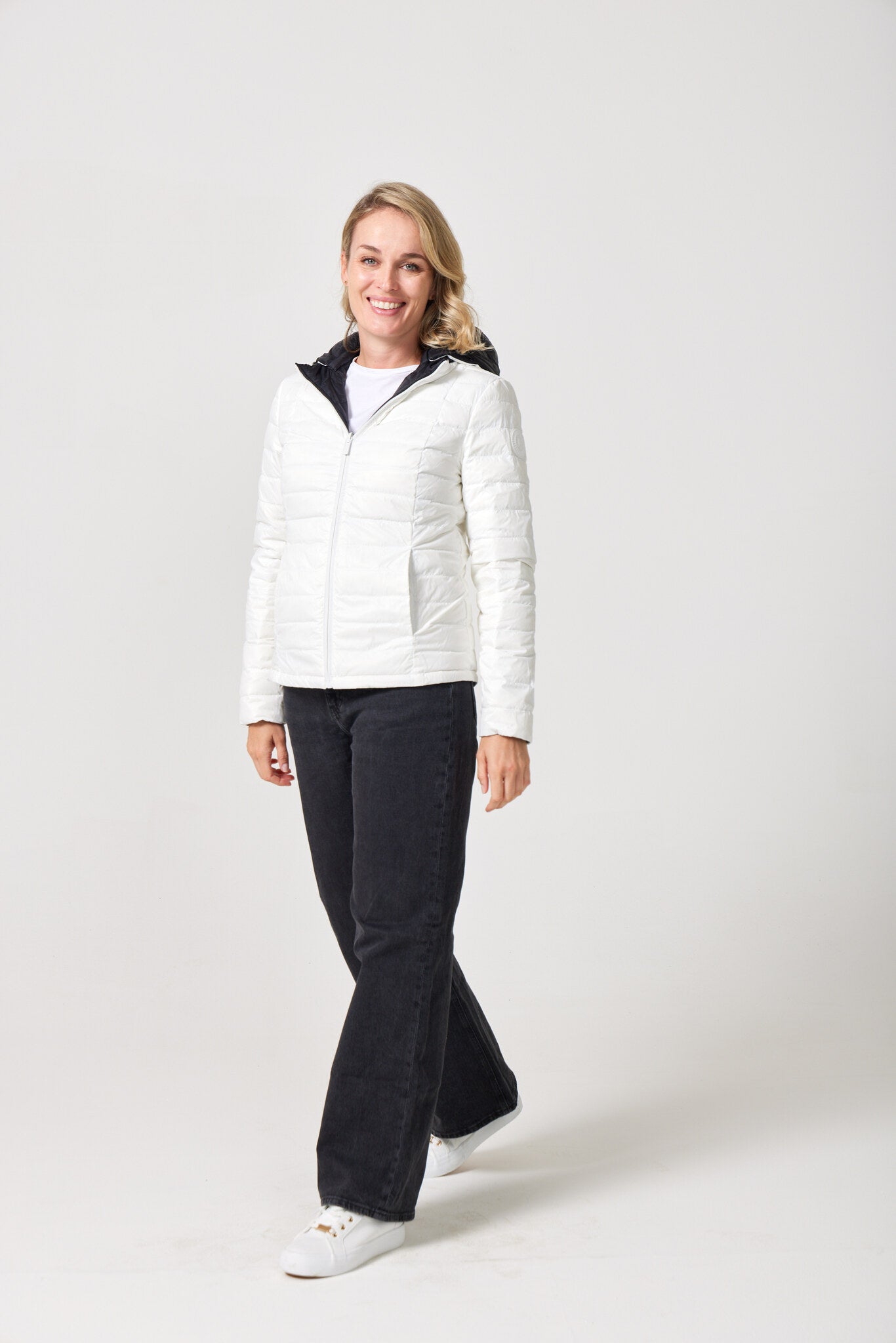 Women’s reversible puffer jacket in white and black, lightweight and warm for layering in South Africa — Midnight x Salt Classic Jacket™