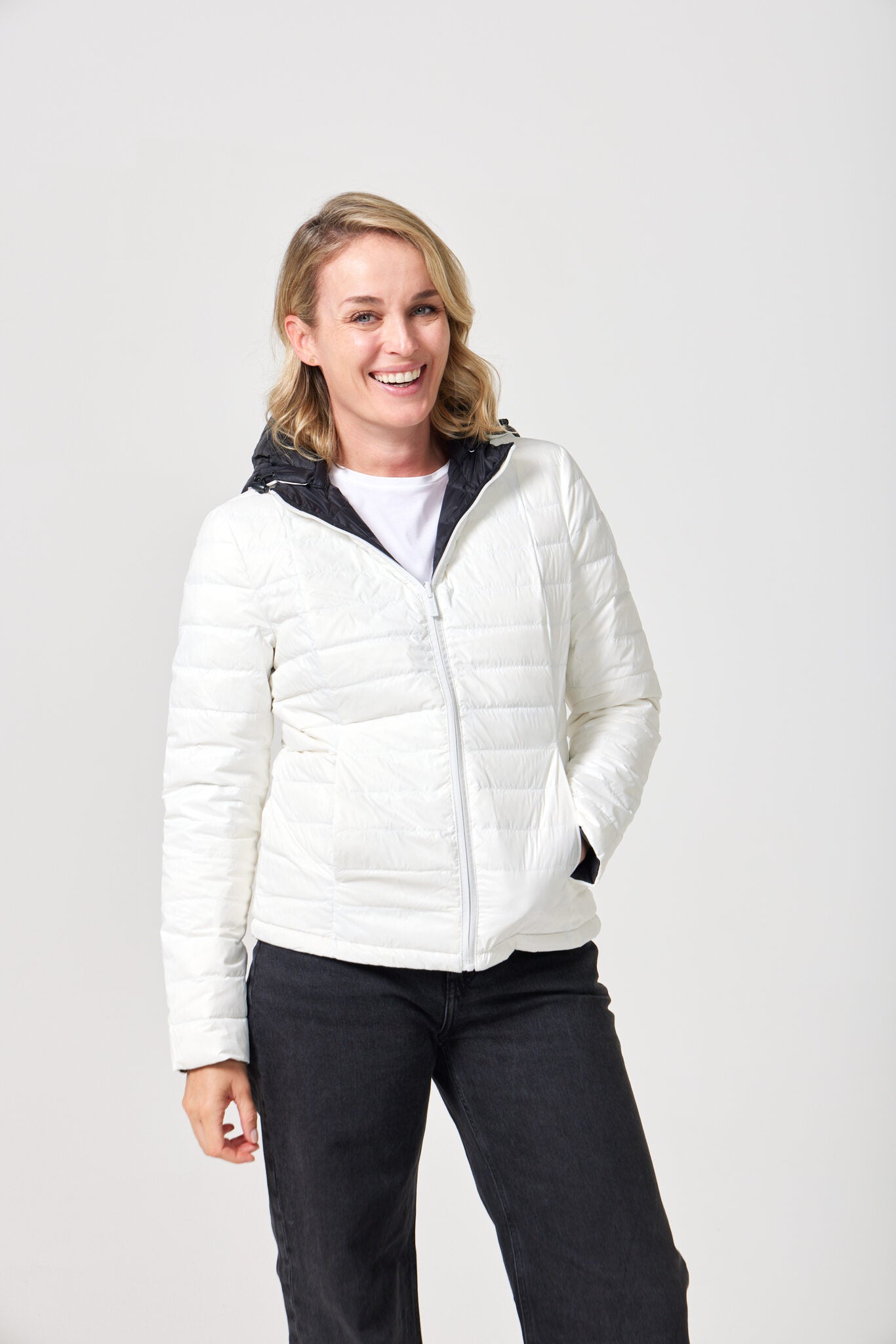 Women’s reversible puffer jacket in white and black, lightweight and warm for layering in South Africa — Midnight x Salt Classic Jacket™