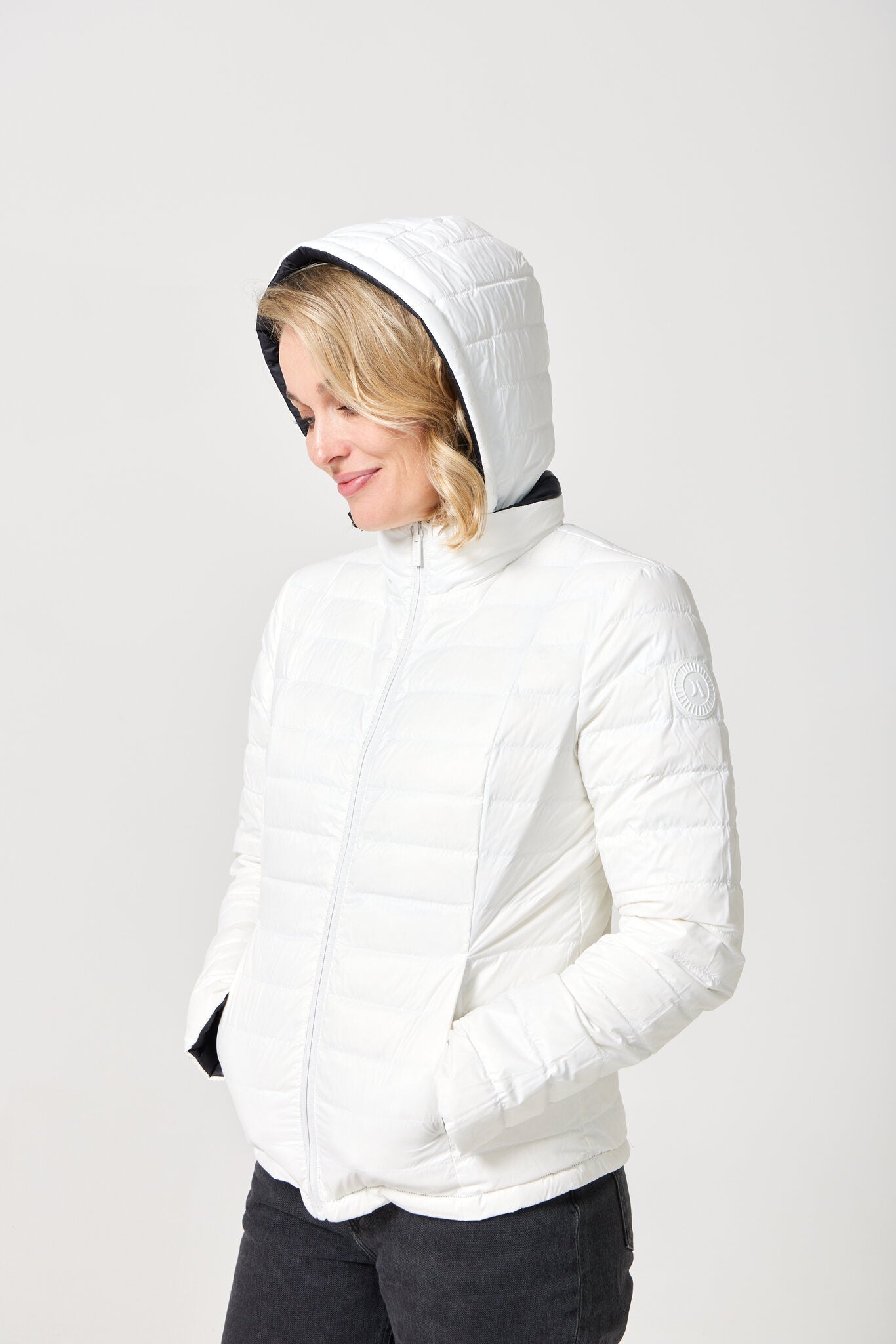 Women’s reversible puffer jacket in white and black, lightweight and warm for layering in South Africa — Midnight x Salt Classic Jacket™