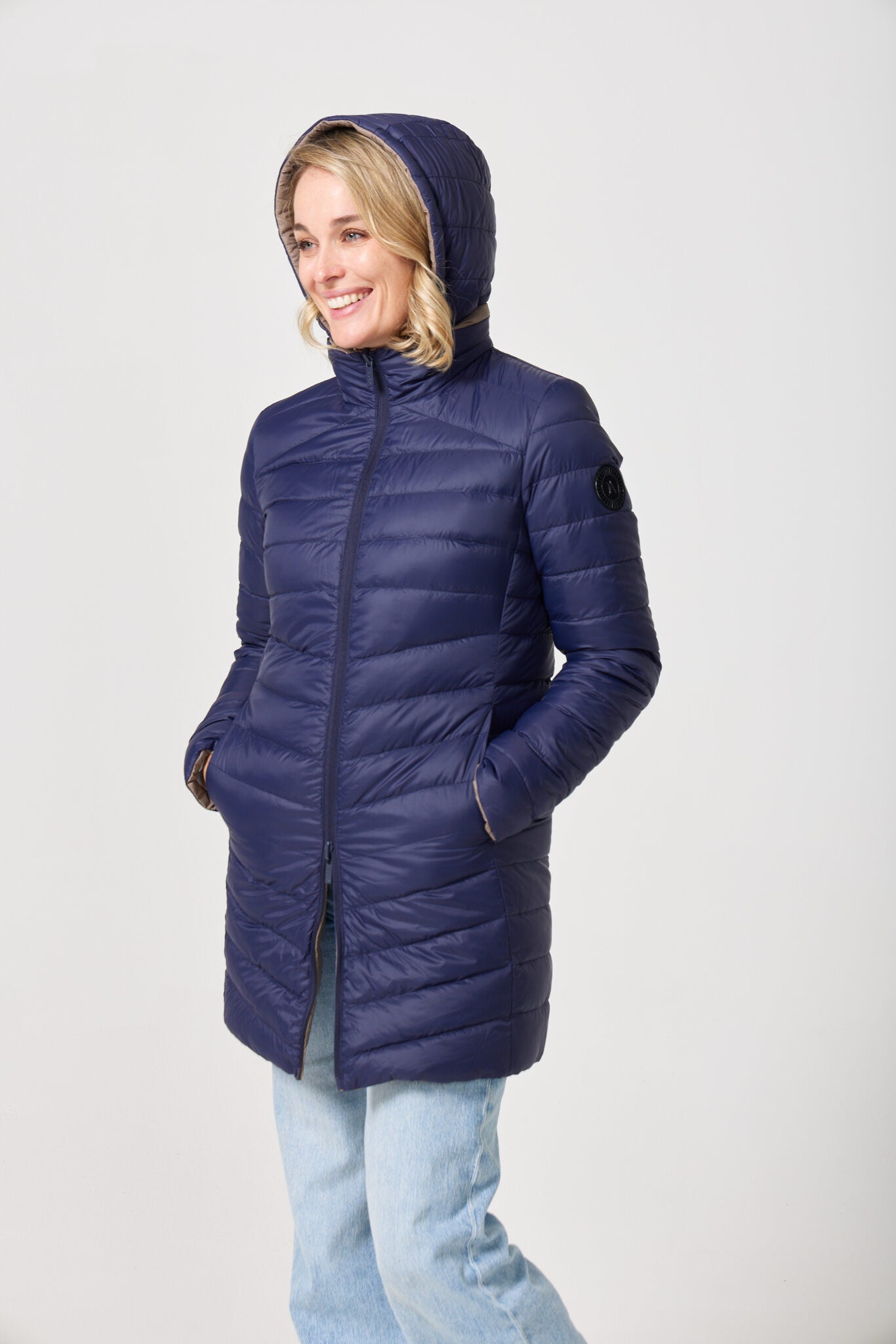 Toffee x Navy Classic Parka™ reversible insulated hooded parka in navy blue and toffee, designed for warmth and versatility in South Africa’s winter season