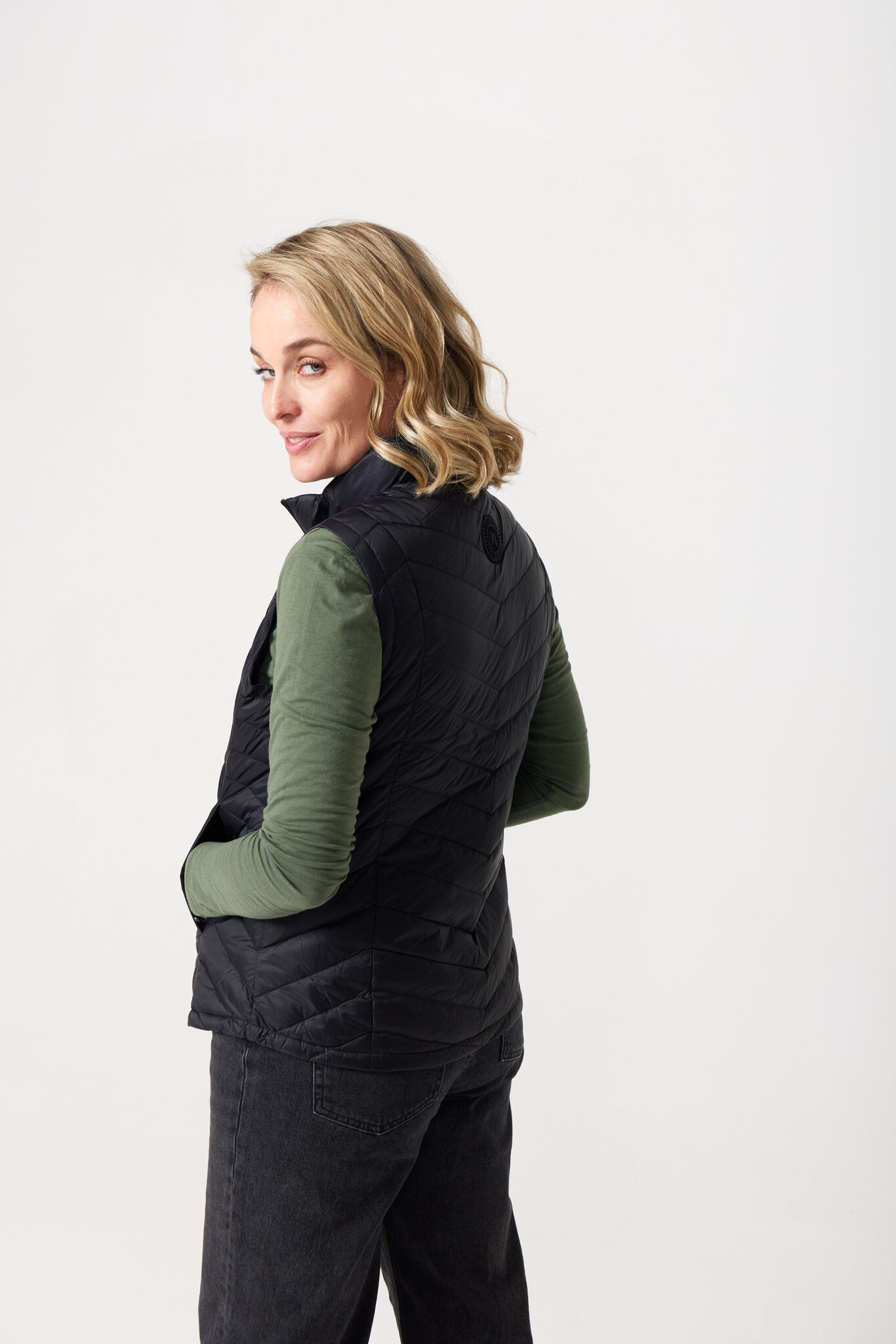 Midnight Classic Gilet™ — women’s sleeveless puffer vest in sleek midnight black, lightweight and versatile for layering in South Africa.