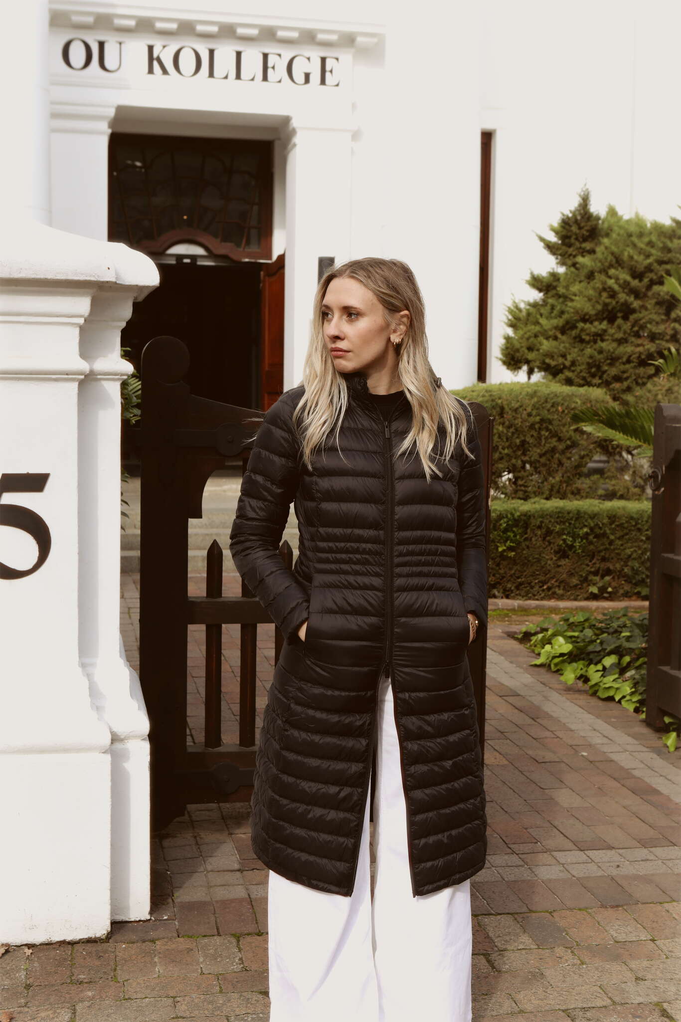 Women’s insulated ultra-length hooded parka in midnight black, designed for extra warmth and comfort in South Africa’s winter season — Midnight Ultra Parka™