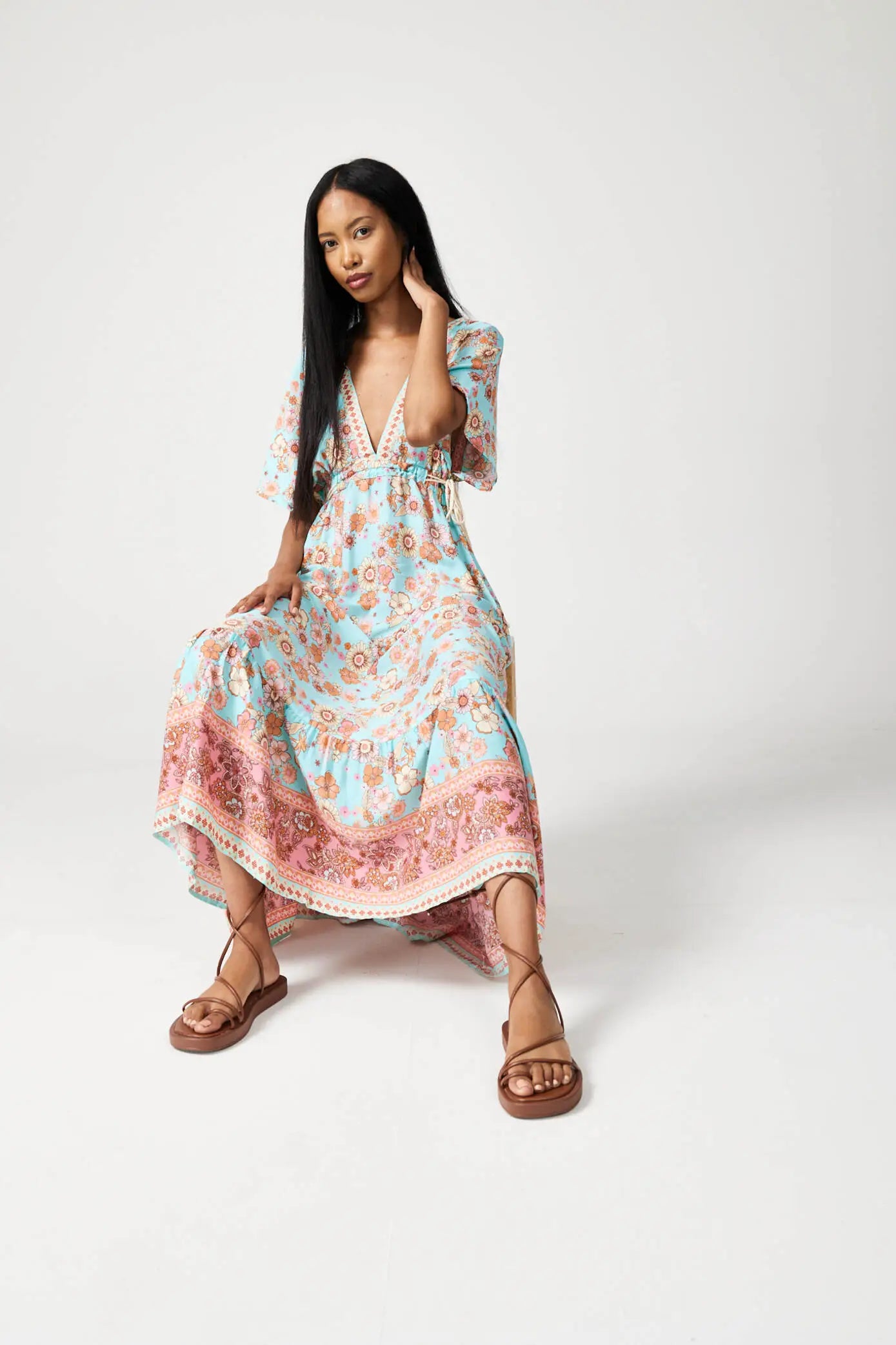 Women’s floral sundress in light blue and pink with a deep V-neck and flowy fit, lightweight summer dress from Duck Apparel South Africa