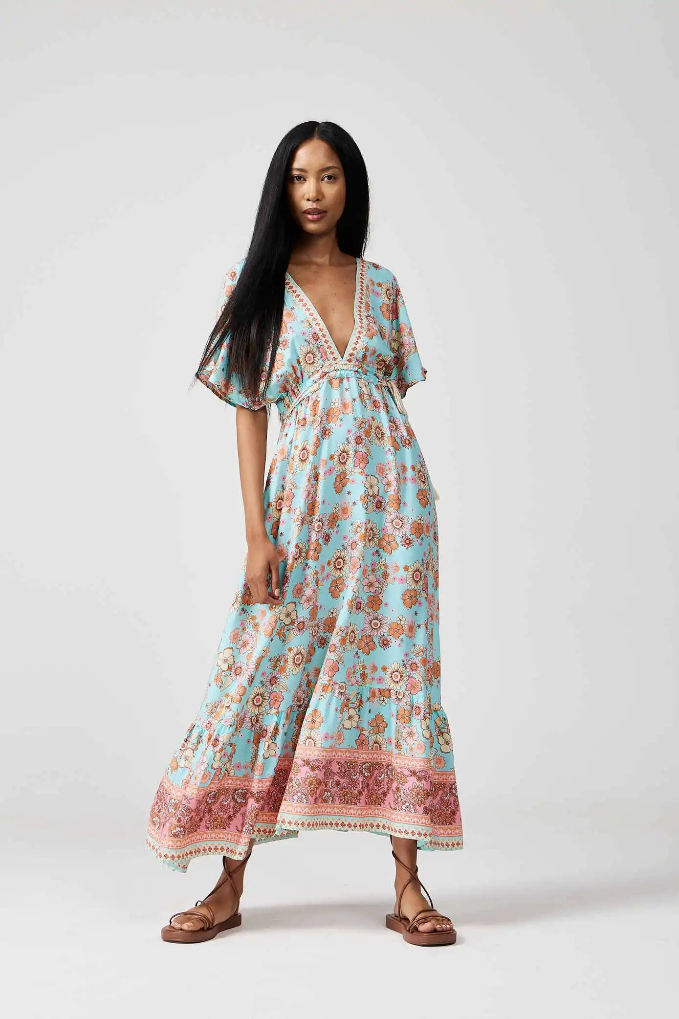 Women’s floral sundress in light blue and pink with a deep V-neck and flowy fit, lightweight summer dress from Duck Apparel South Africa