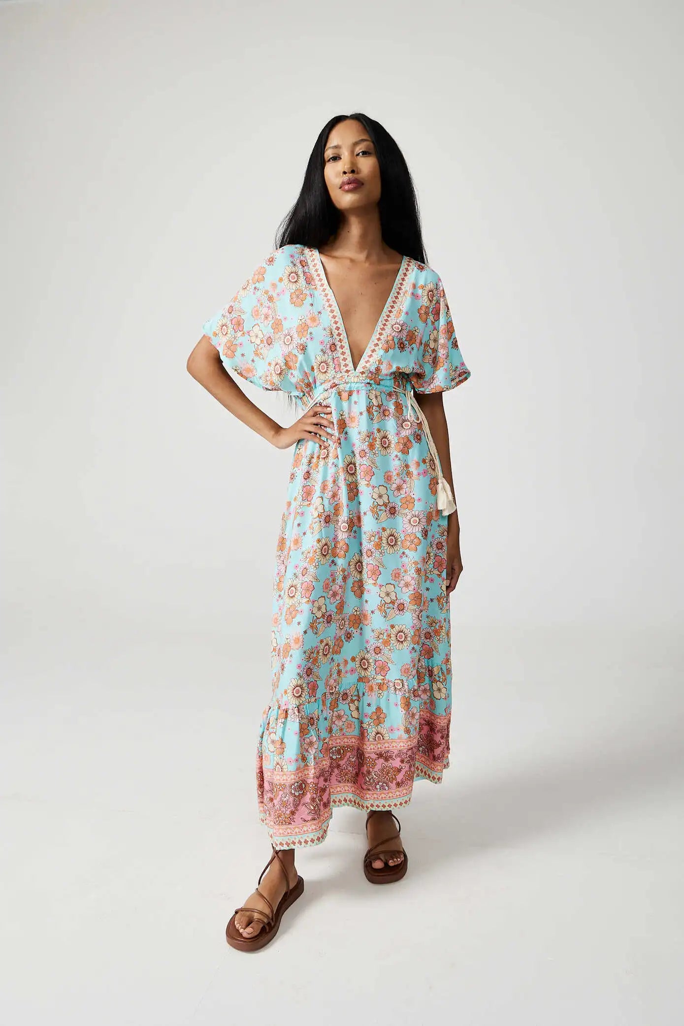 Women’s floral sundress in light blue and pink with a deep V-neck and flowy fit, lightweight summer dress from Duck Apparel South Africa