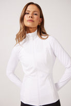White Lightweight performance jacket with a smooth, sculpting fit, full zip front, high collar, and stretch fabric designed for everyday movement and layering.