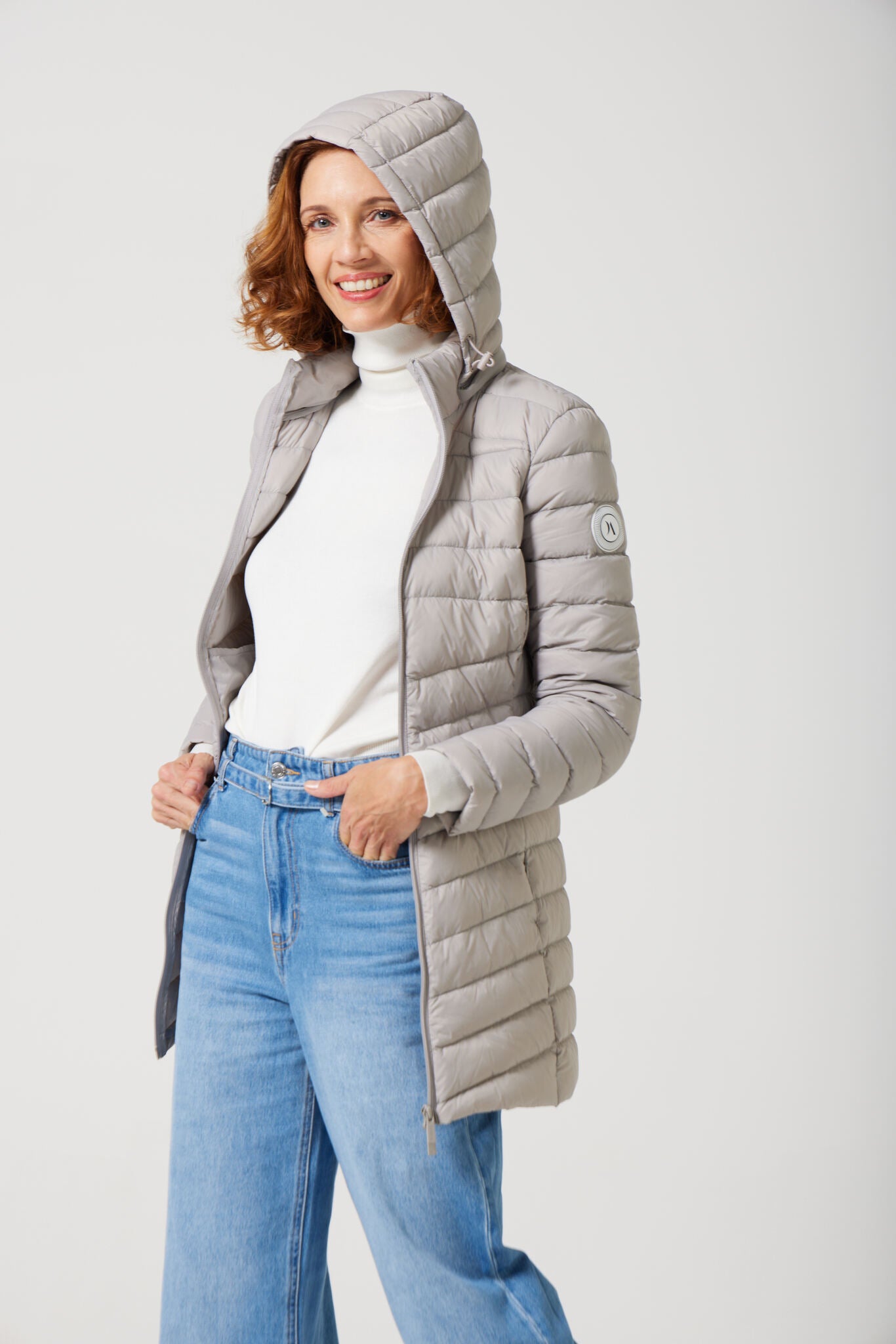 Women’s insulated hooded parka in latte, designed for warmth and comfort in South Africa’s winter season — Latte Classic Parka™