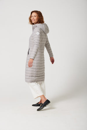 Women’s insulated ultra-length hooded parka in latte beige, designed for extra warmth and comfort in South Africa’s winter season — Latte Ultra Parka™