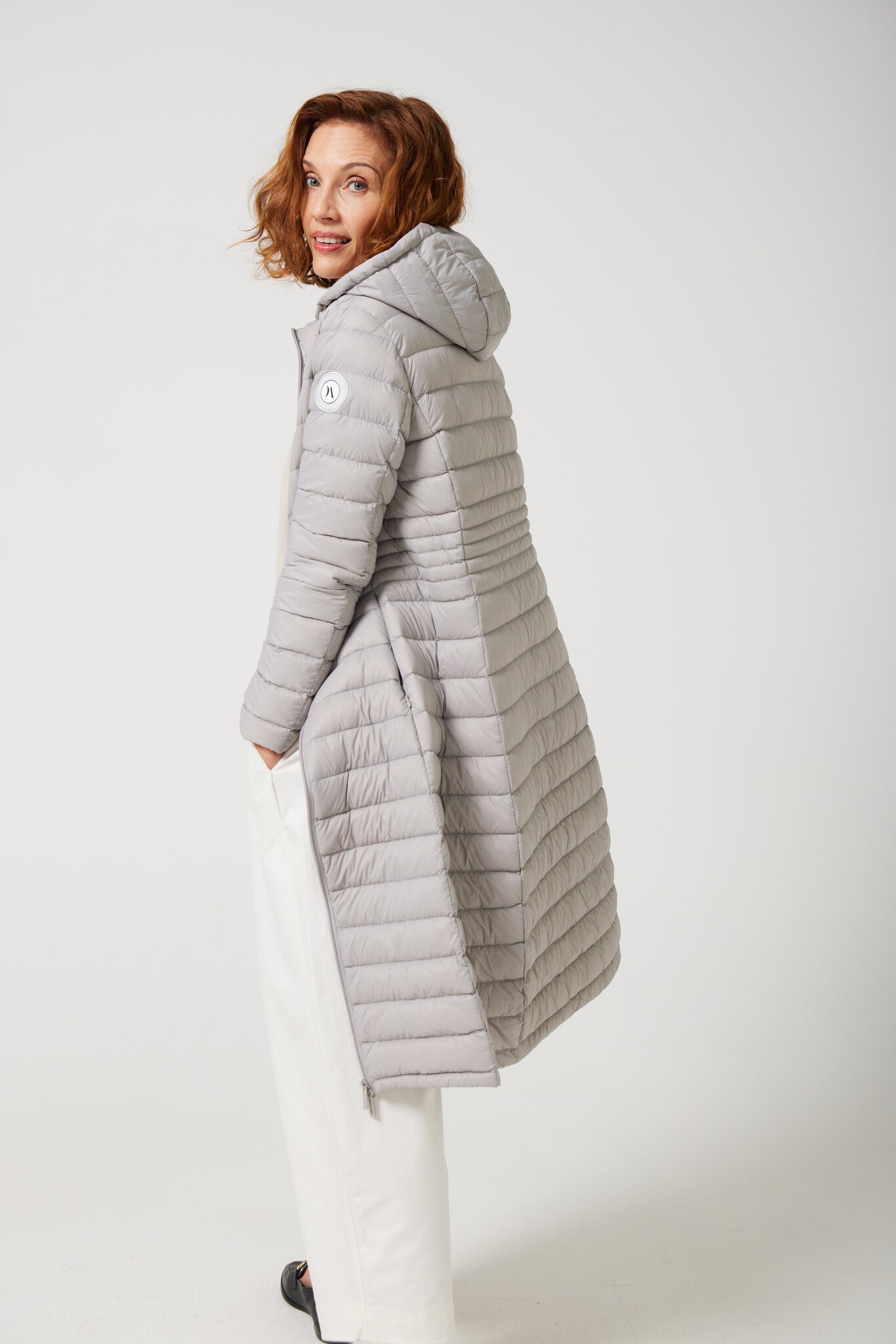 Women’s insulated ultra-length hooded parka in latte beige, designed for extra warmth and comfort in South Africa’s winter season — Latte Ultra Parka™