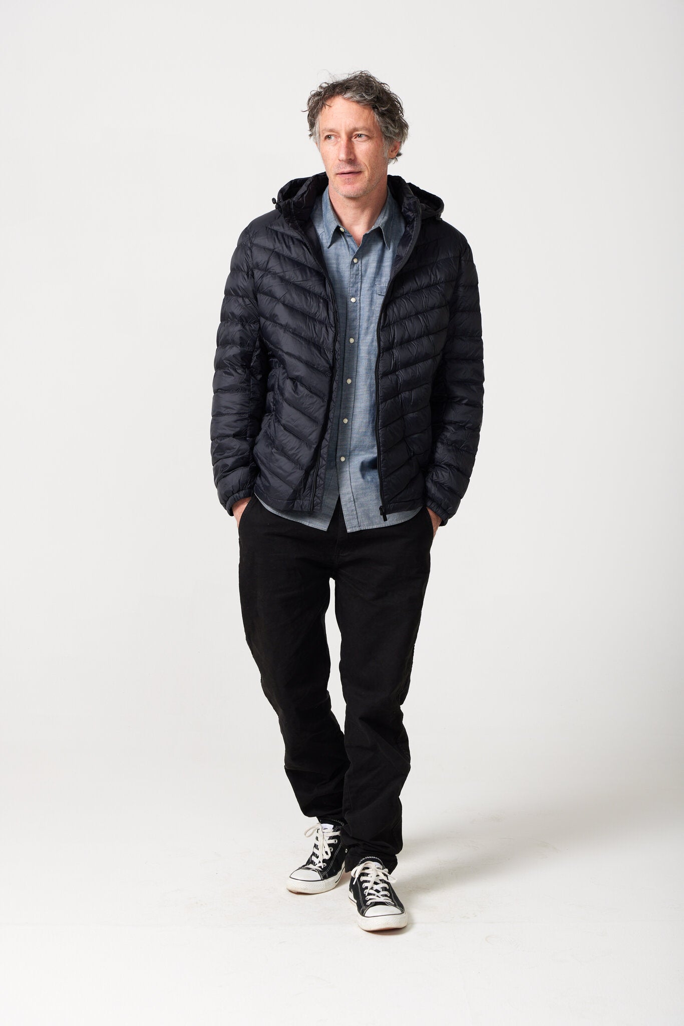 Men’s Black Classic Jacket™ in sleek black, lightweight hooded puffer jacket for layering in cool South African weather