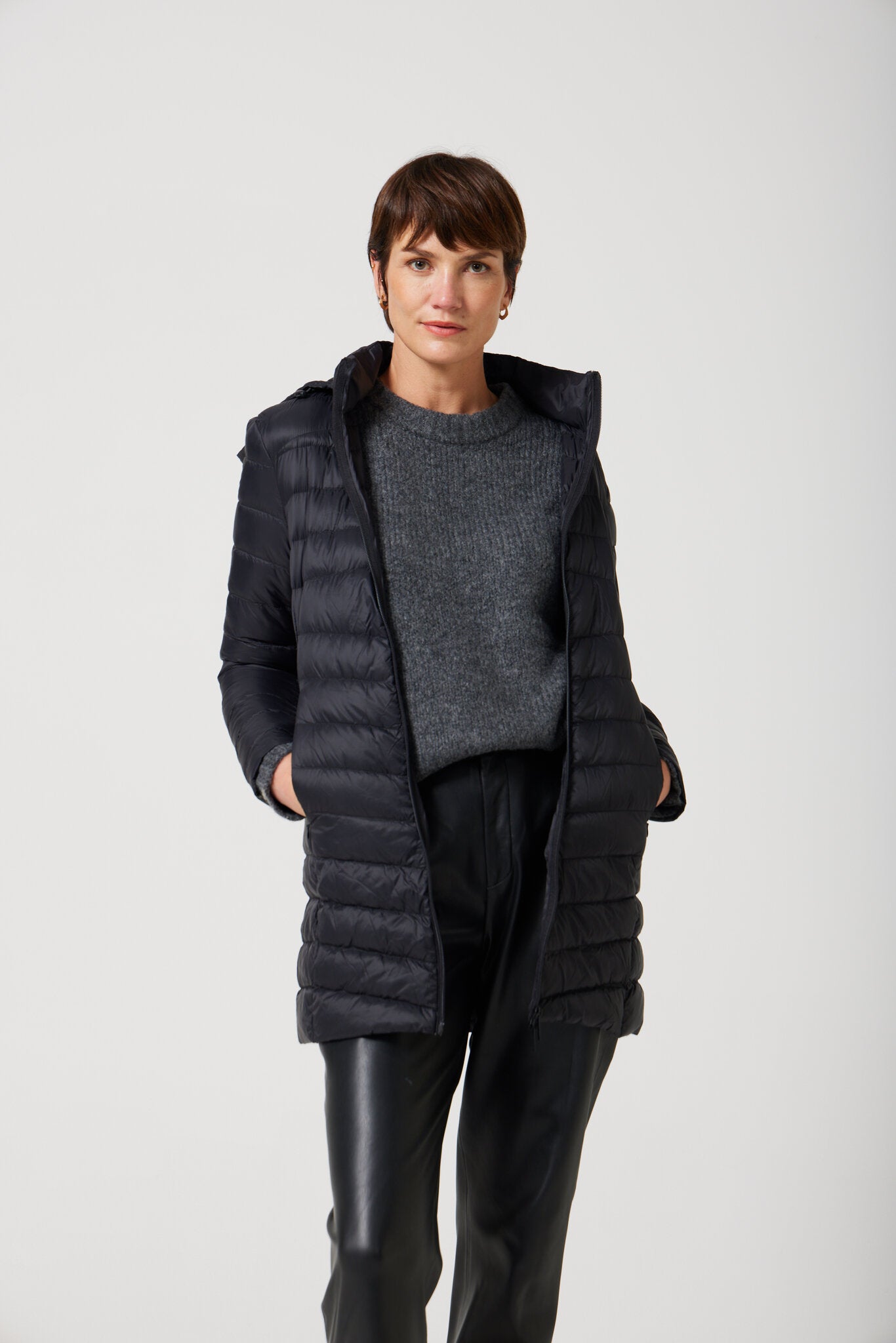 Women’s insulated hooded parka in midnight black, designed for warmth and comfort in South Africa’s winter season — Midnight Classic Parka™