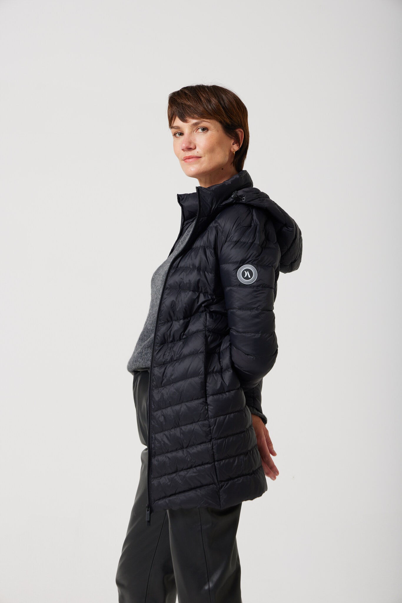 Women’s insulated hooded parka in midnight black, designed for warmth and comfort in South Africa’s winter season — Midnight Classic Parka™