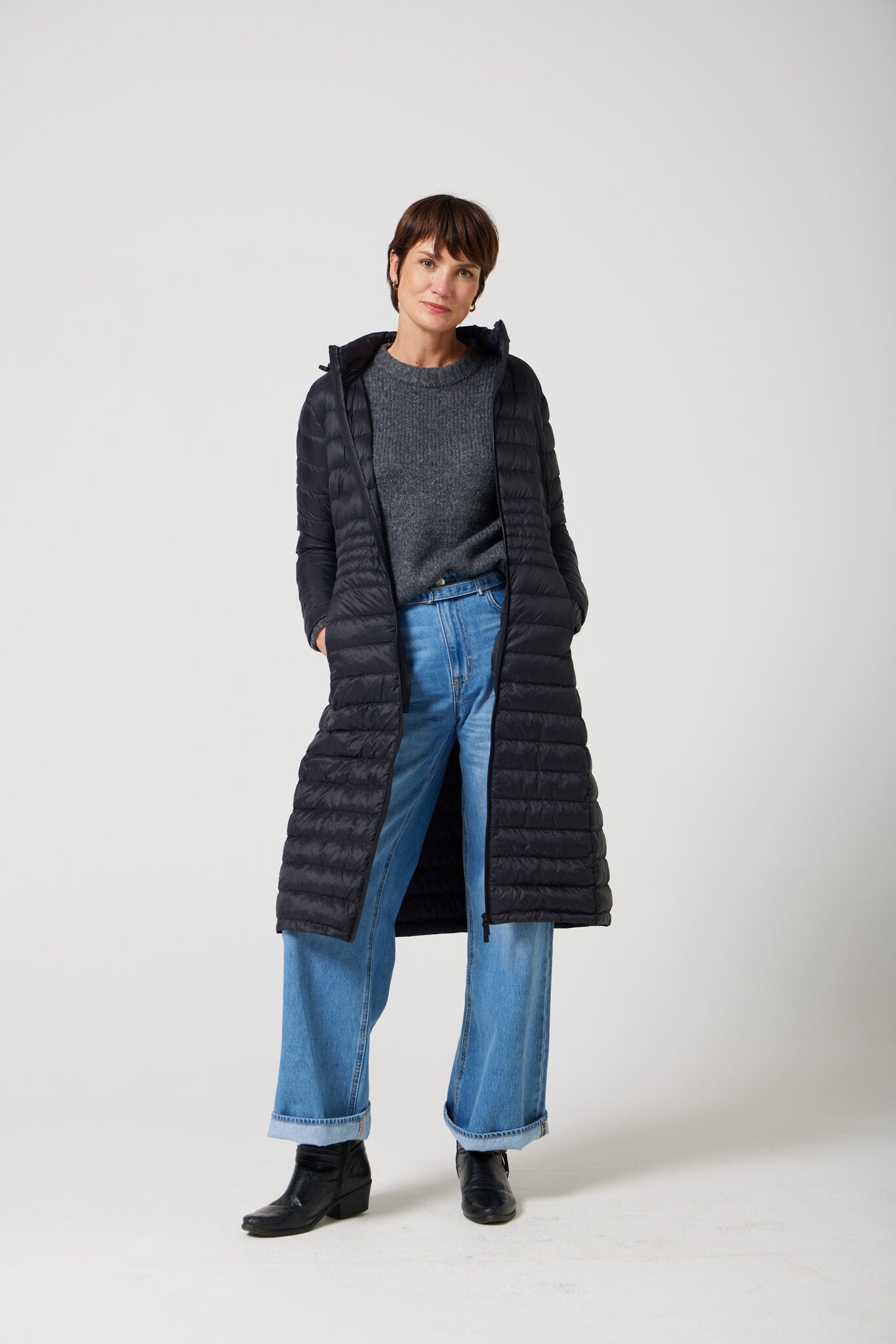 Women’s insulated ultra-length hooded parka in midnight black, designed for extra warmth and comfort in South Africa’s winter season — Midnight Ultra Parka™