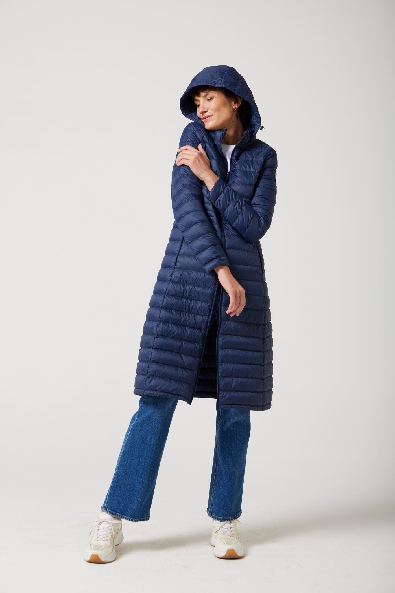 Women’s insulated ultra-length hooded parka in navy blue, designed for extra warmth and comfort in South Africa’s winter season — Navy Ultra Parka™