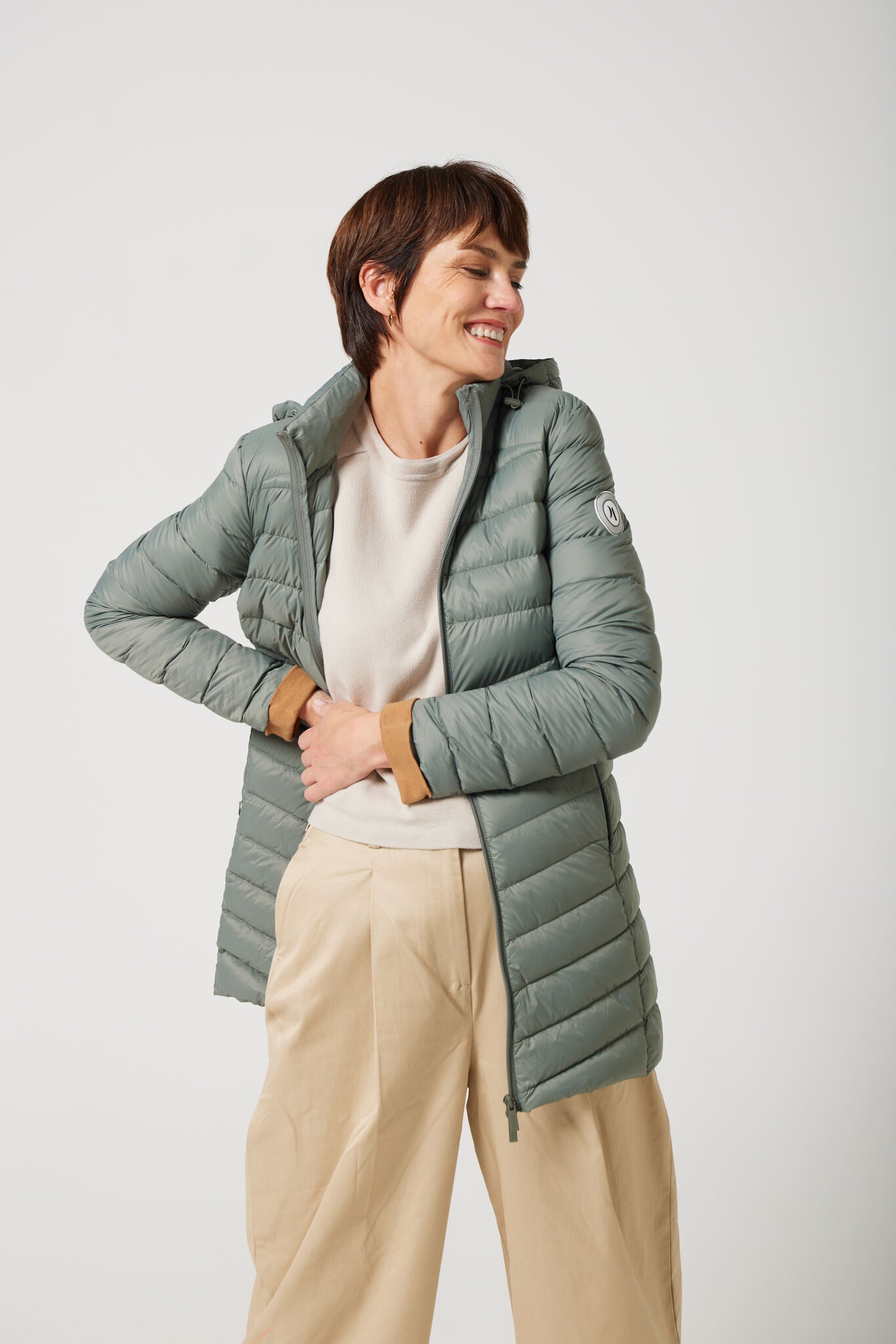 Women’s insulated hooded parka in sage green, designed for warmth and comfort in South Africa’s winter season — Sage Classic Parka™