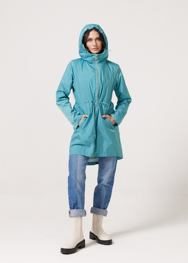 Windsor Azure raincoat in turquoise, lightweight hooded waterproof raincoat ideal for South Africa’s rainy season and wet climate