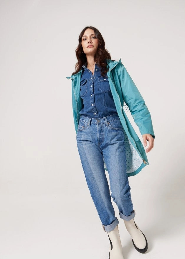 Windsor Azure raincoat in turquoise, lightweight hooded waterproof raincoat ideal for South Africa’s rainy season and wet climate