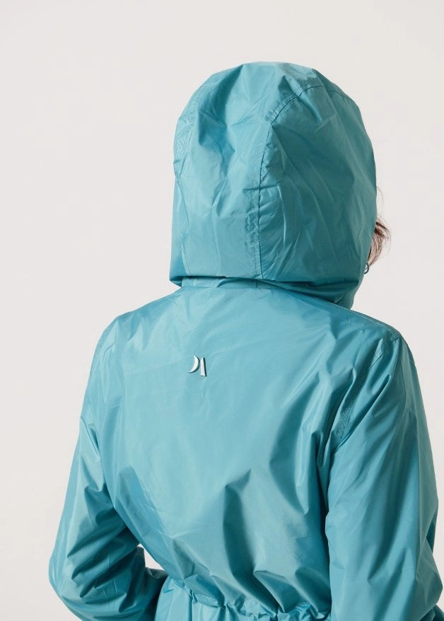 Windsor Azure raincoat in turquoise, lightweight hooded waterproof raincoat ideal for South Africa’s rainy season and wet climate
