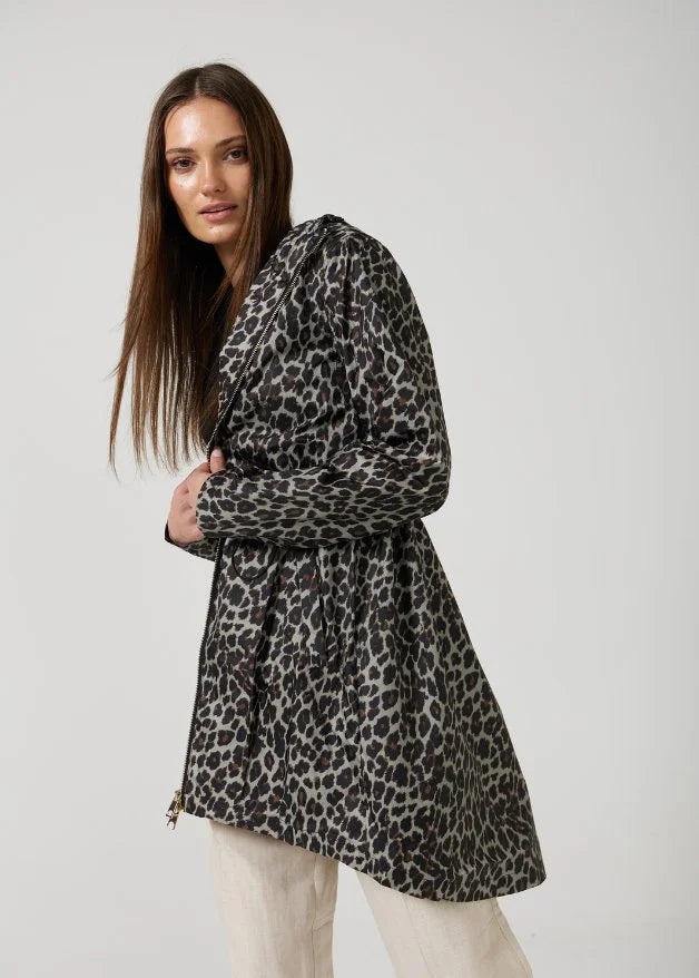 The Cape Leopard raincoat in animal print, lightweight hooded waterproof raincoat ideal for South Africa’s rainy season and wet climate