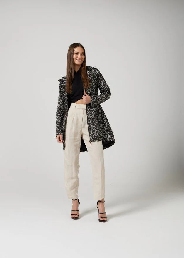 The Cape Leopard raincoat in animal print, lightweight hooded waterproof raincoat ideal for South Africa’s rainy season and wet climate