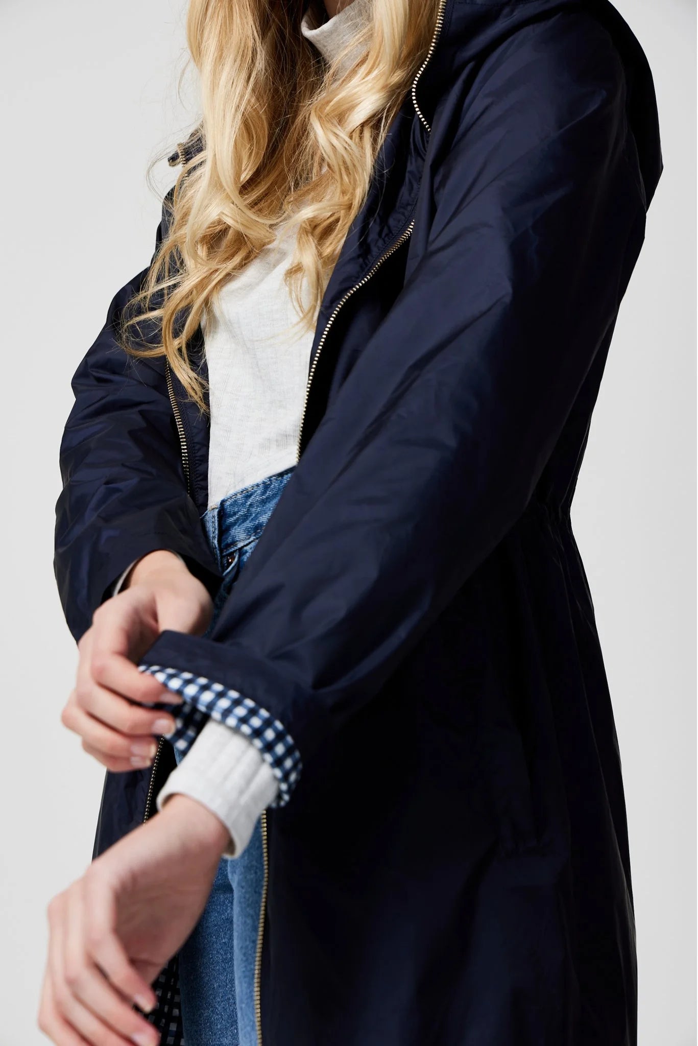 The Oxford Blue raincoat in navy blue, lightweight hooded waterproof raincoat ideal for South Africa’s rainy season and wet climate