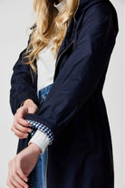 The Oxford Blue raincoat in navy blue, lightweight hooded waterproof raincoat ideal for South Africa’s rainy season and wet climate