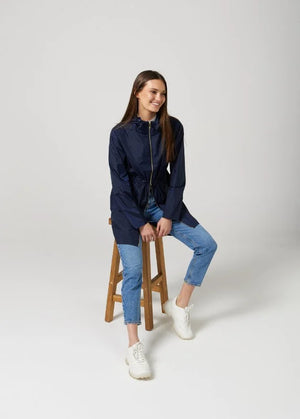 The Oxford Blue raincoat in navy blue, lightweight hooded waterproof raincoat ideal for South Africa’s rainy season and wet climate